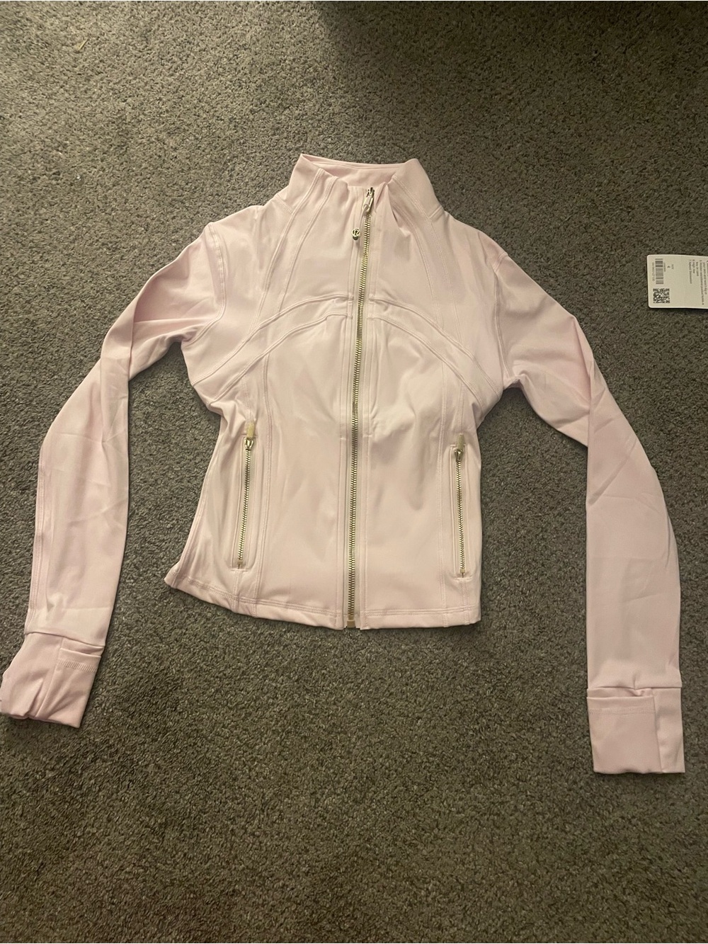 Light pink lululemon jacket size medium/4